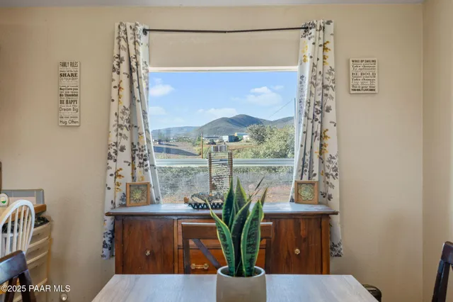 a view of balcony with furniture