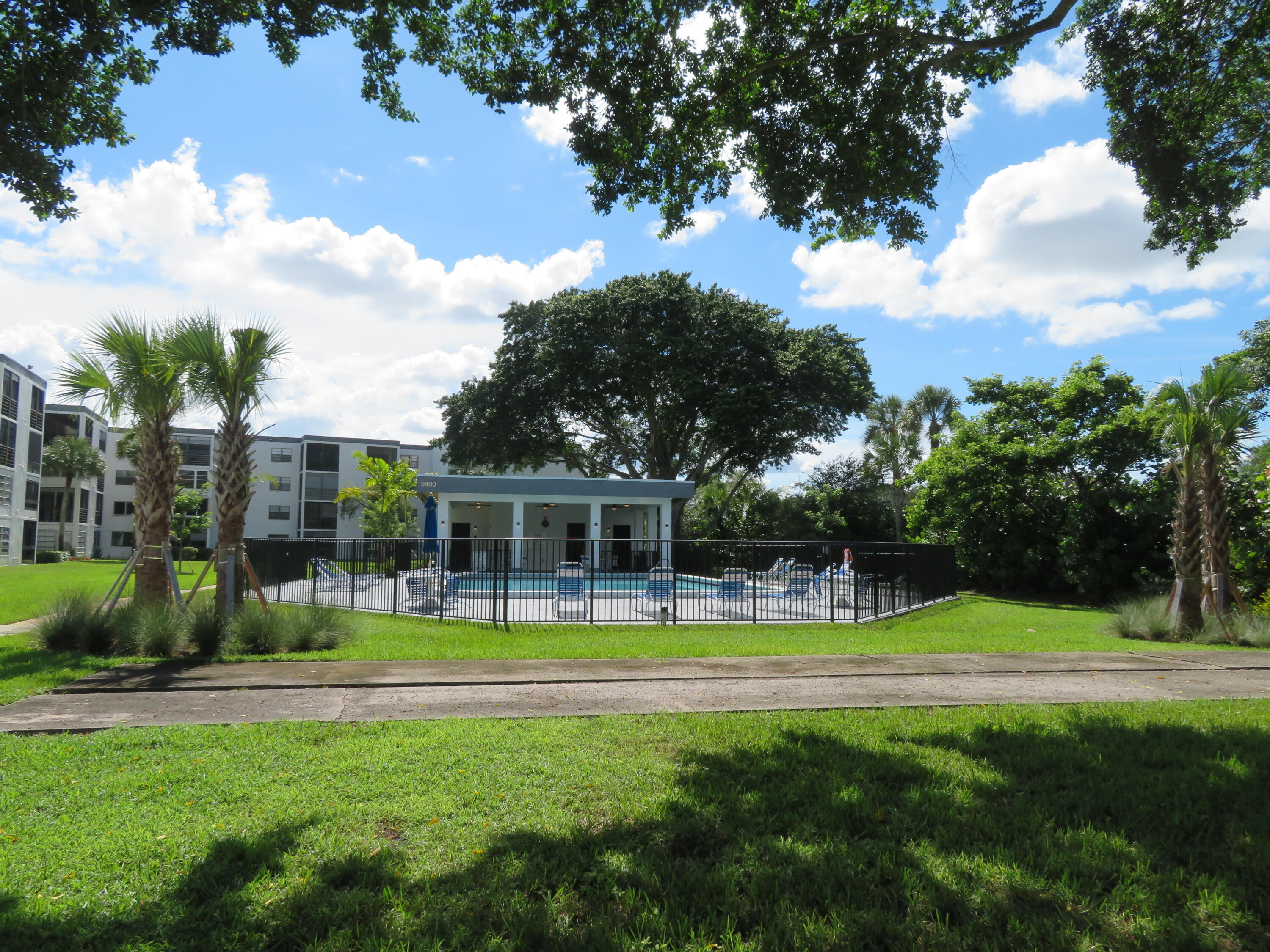 9233 Southwest 8th Street, Unit 117 Boca Raton, FL 33428 - Photo 15 of 37 34_9233_Bldg._Pool