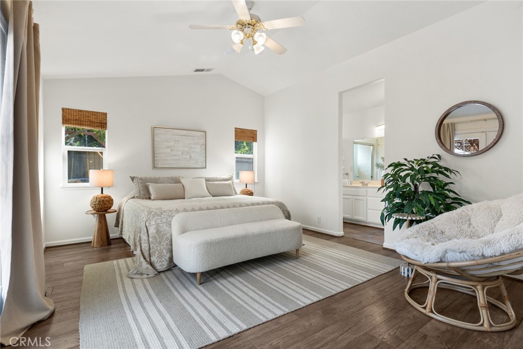 1517 Ridgebrook Way Chico, CA 95928 - Photo 12 of 28 a living room with furniture a table and wooden floor