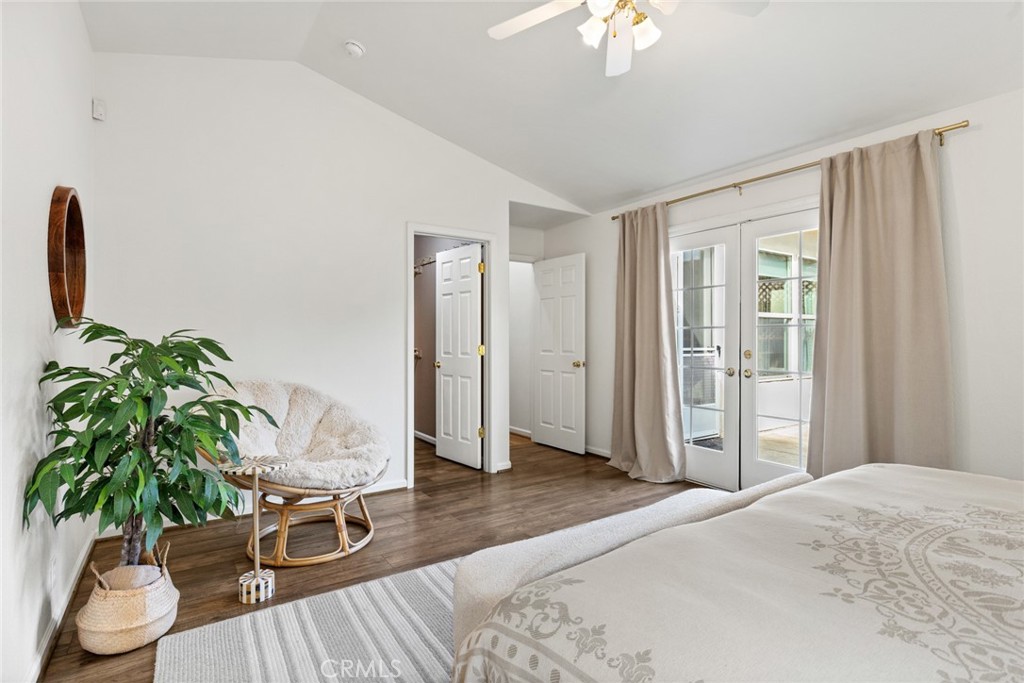 1517 Ridgebrook Way Chico, CA 95928 - Photo 13 of 28 a bedroom with furniture and a potted plant