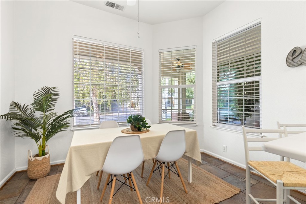 1517 Ridgebrook Way Chico, CA 95928 - Photo 10 of 28 a living room with furniture and large windows