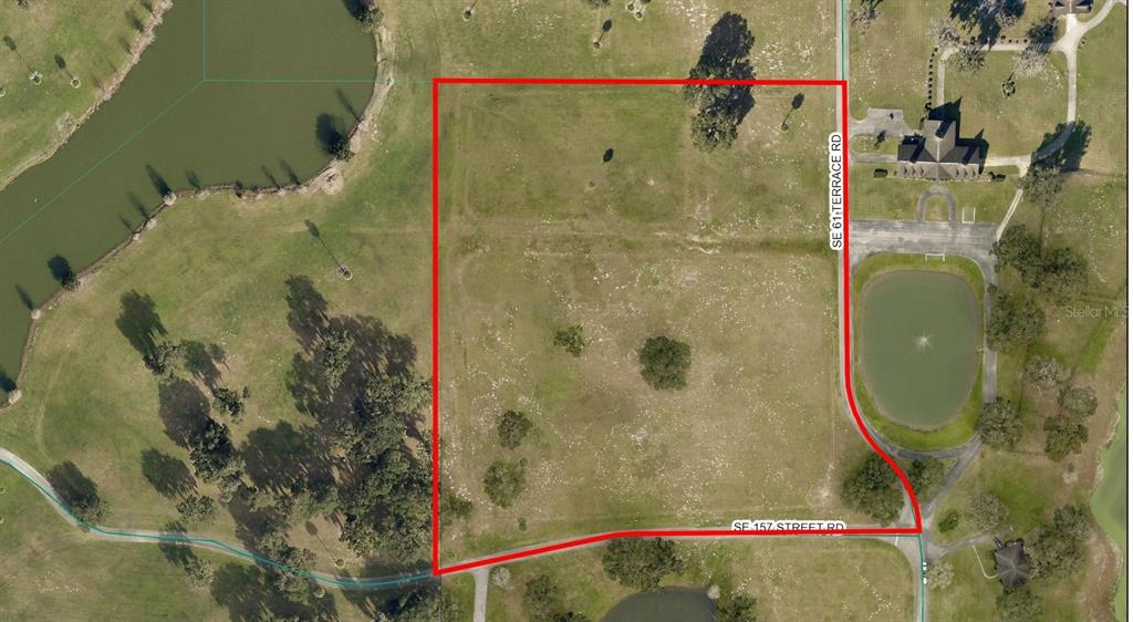 0 Southeast 61st Terrace Road, Unit 16 Summerfield, FL 34491 - Photo 13 of 15 a bathroom with a shower and a mirror