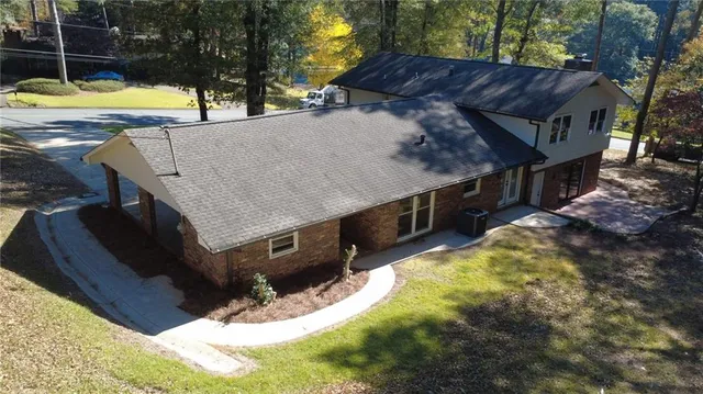 a view of outdoor space with swimming pool and yard