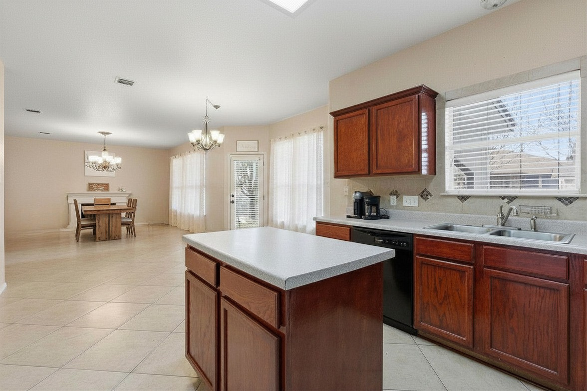 1424 Marsh Harbour Drive Round Rock, TX 78664 - Photo 7 of 23 Kitchen & Dining