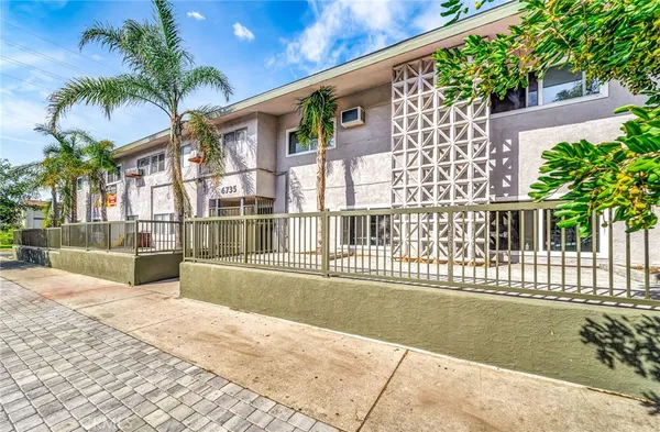 a view of a house with a swimming pool