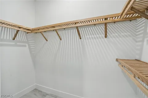 a view of a room with racks on the wall