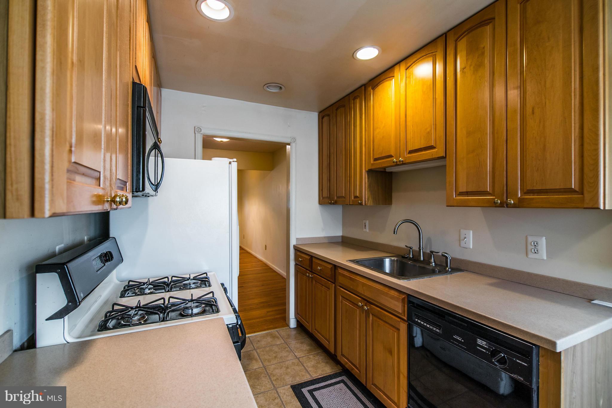 508 Orrin Street Southeast Vienna, VA 22180 - Photo 2 of 30 a kitchen with a sink a stove and cabinets