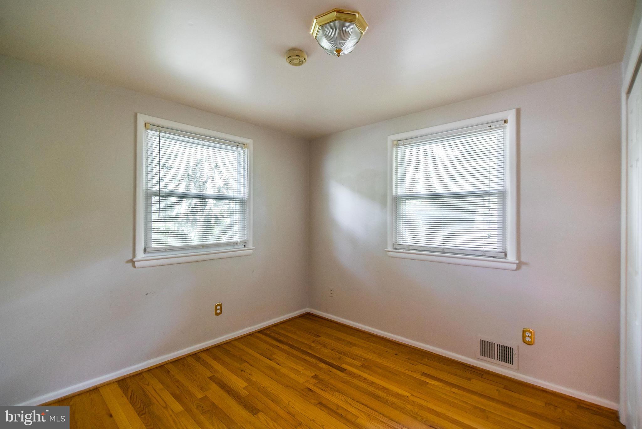 508 Orrin Street Southeast Vienna, VA 22180 - Photo 15 of 30 a view of an empty room with wooden floor and a window