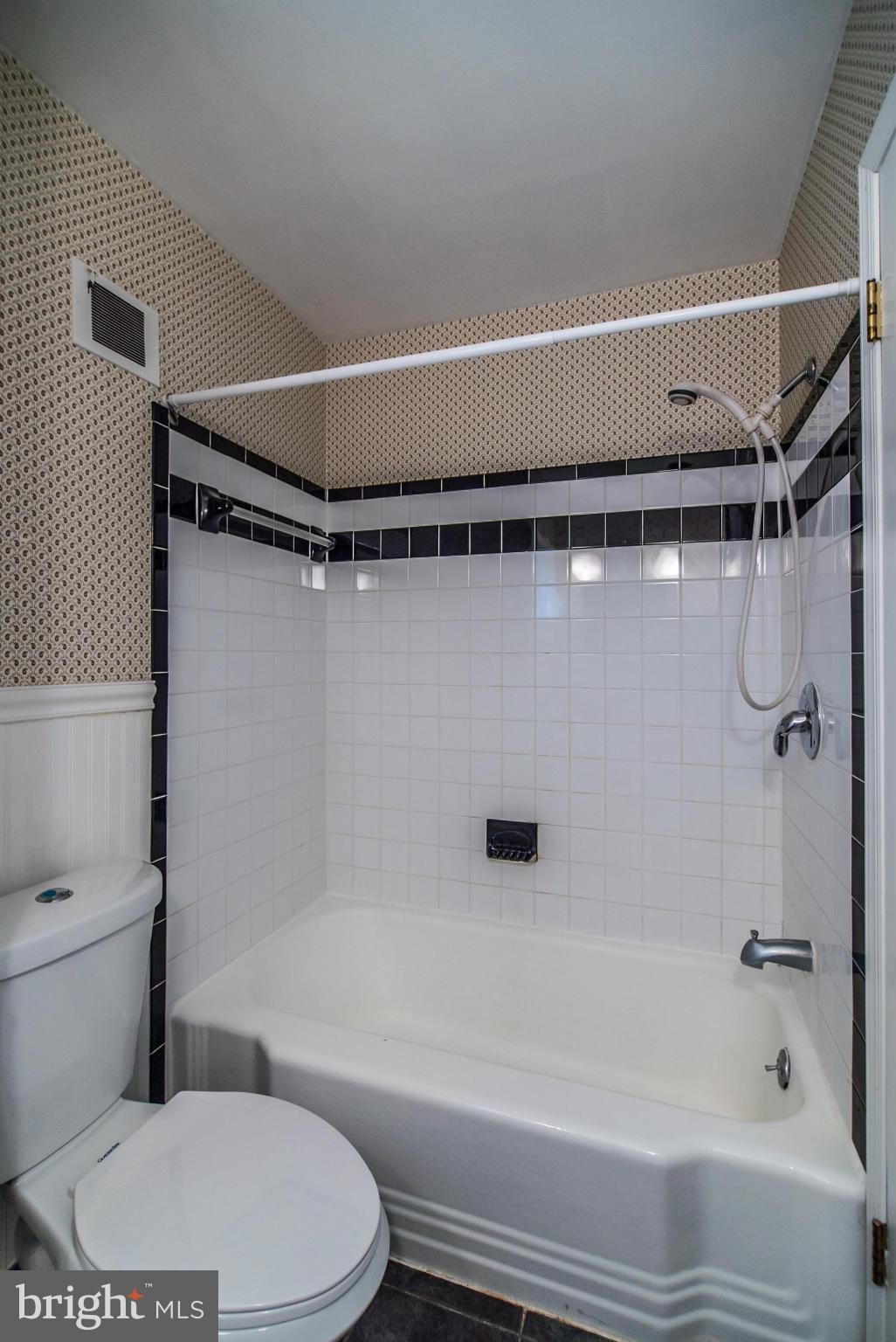 508 Orrin Street Southeast Vienna, VA 22180 - Photo 18 of 30 a bathroom with a toilet and a bath tub