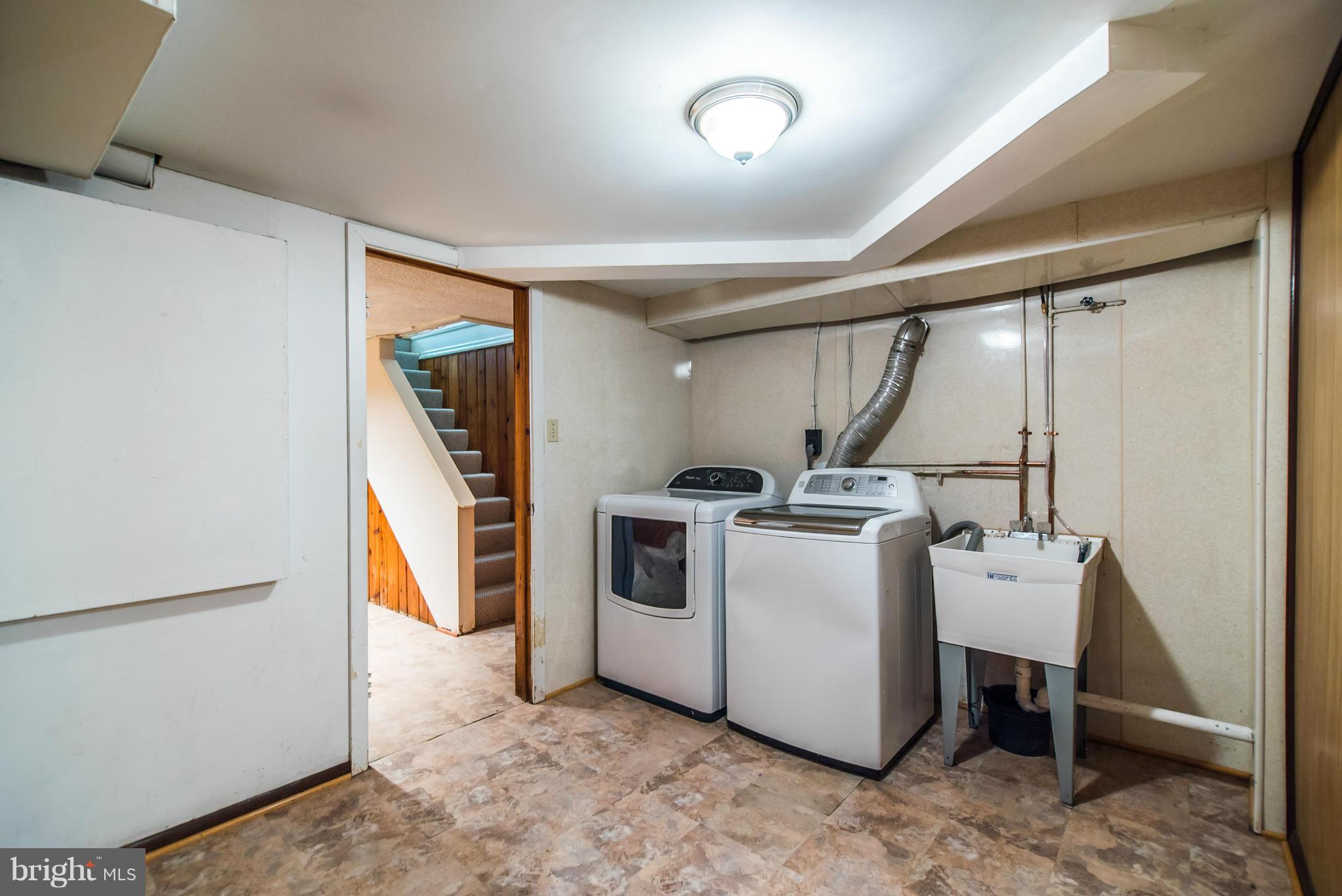 508 Orrin Street Southeast Vienna, VA 22180 - Photo 21 of 30 a view of a storage & utility room with washer and dryer
