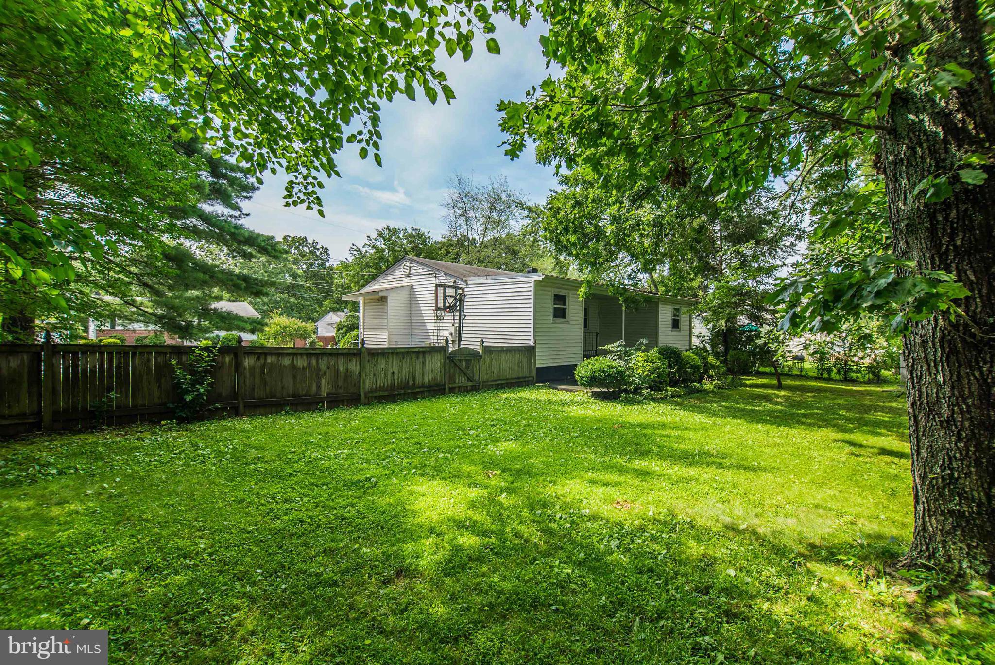 508 Orrin Street Southeast Vienna, VA 22180 - Photo 28 of 30 a view of a backyard with a house and large trees