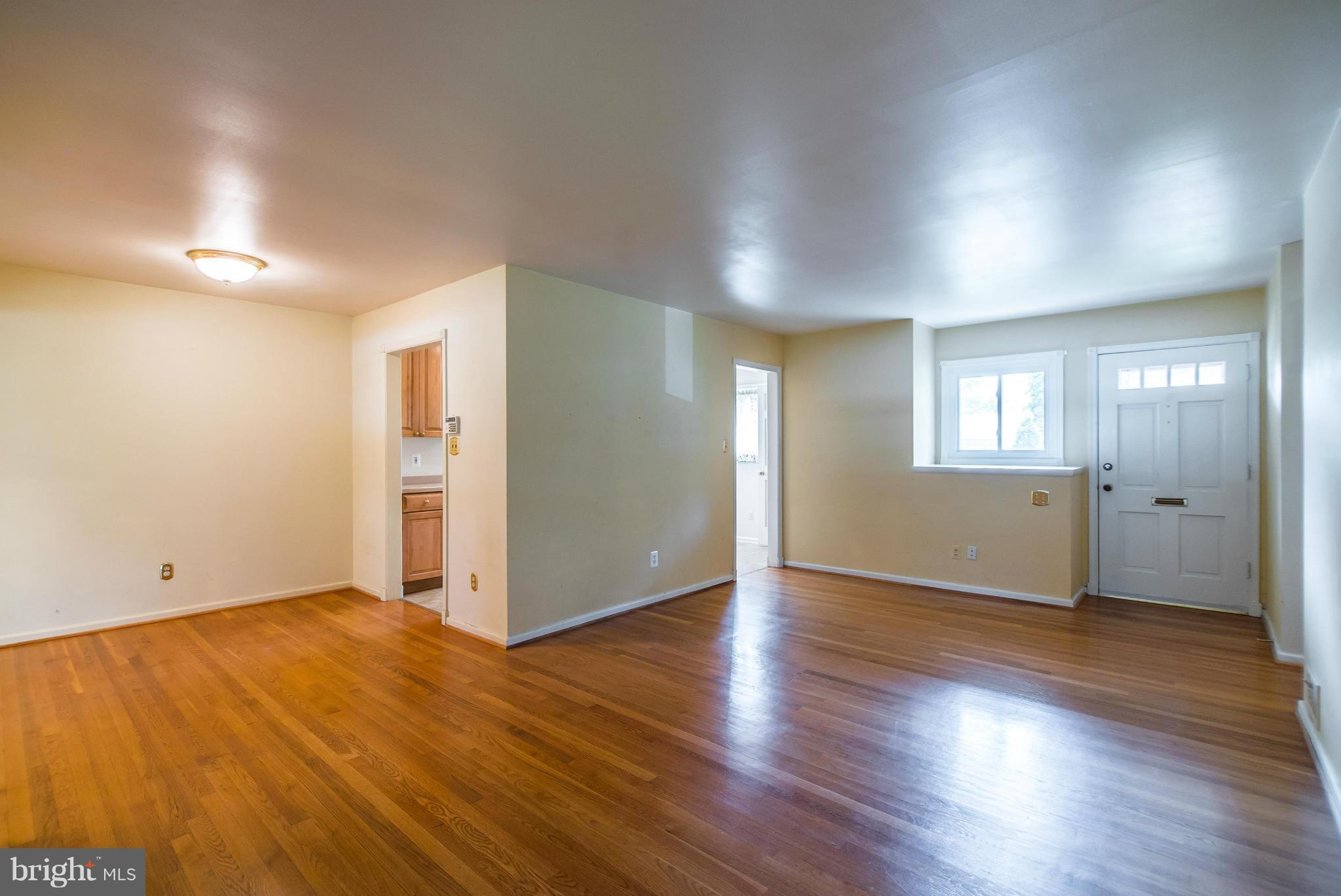 508 Orrin Street Southeast Vienna, VA 22180 - Photo 6 of 30 a view of wooden floor and windows in an empty room