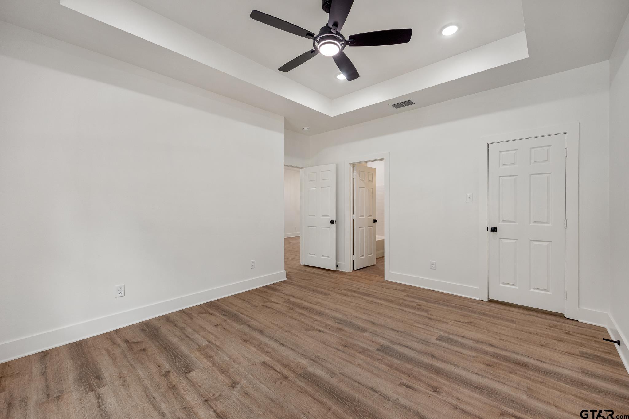 726 Boyd Avenue Tyler, TX 75701 - Photo 18 of 28 wooden floor in an empty room