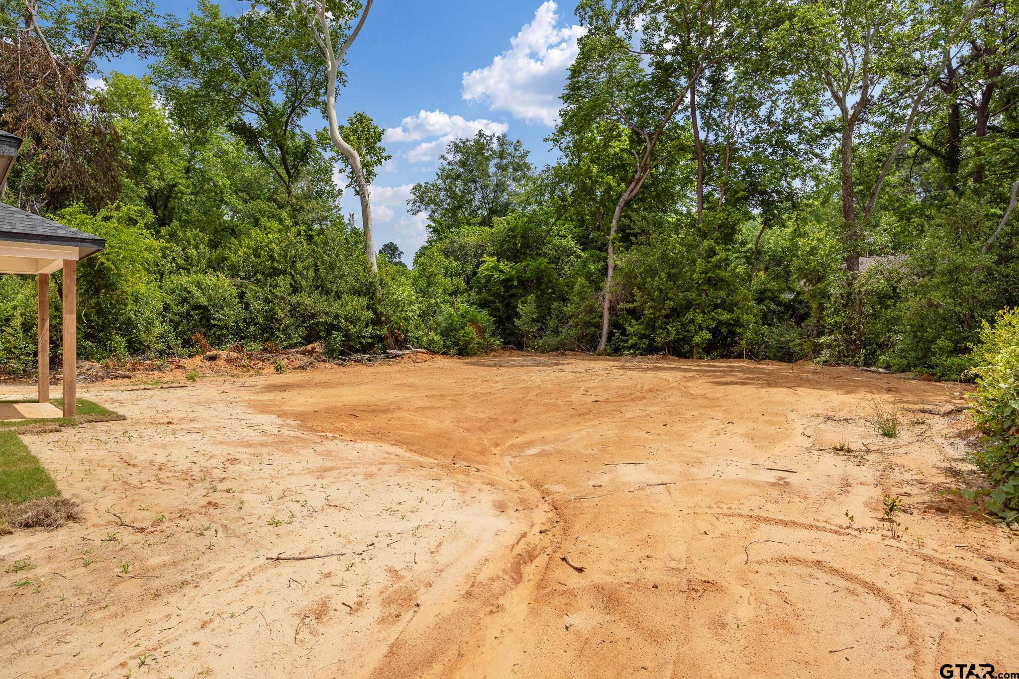 726 Boyd Avenue Tyler, TX 75701 - Photo 28 of 28 a view of wooden fence and trees