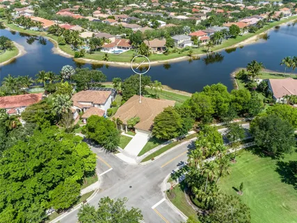 an aerial view of a houses with outdoor space