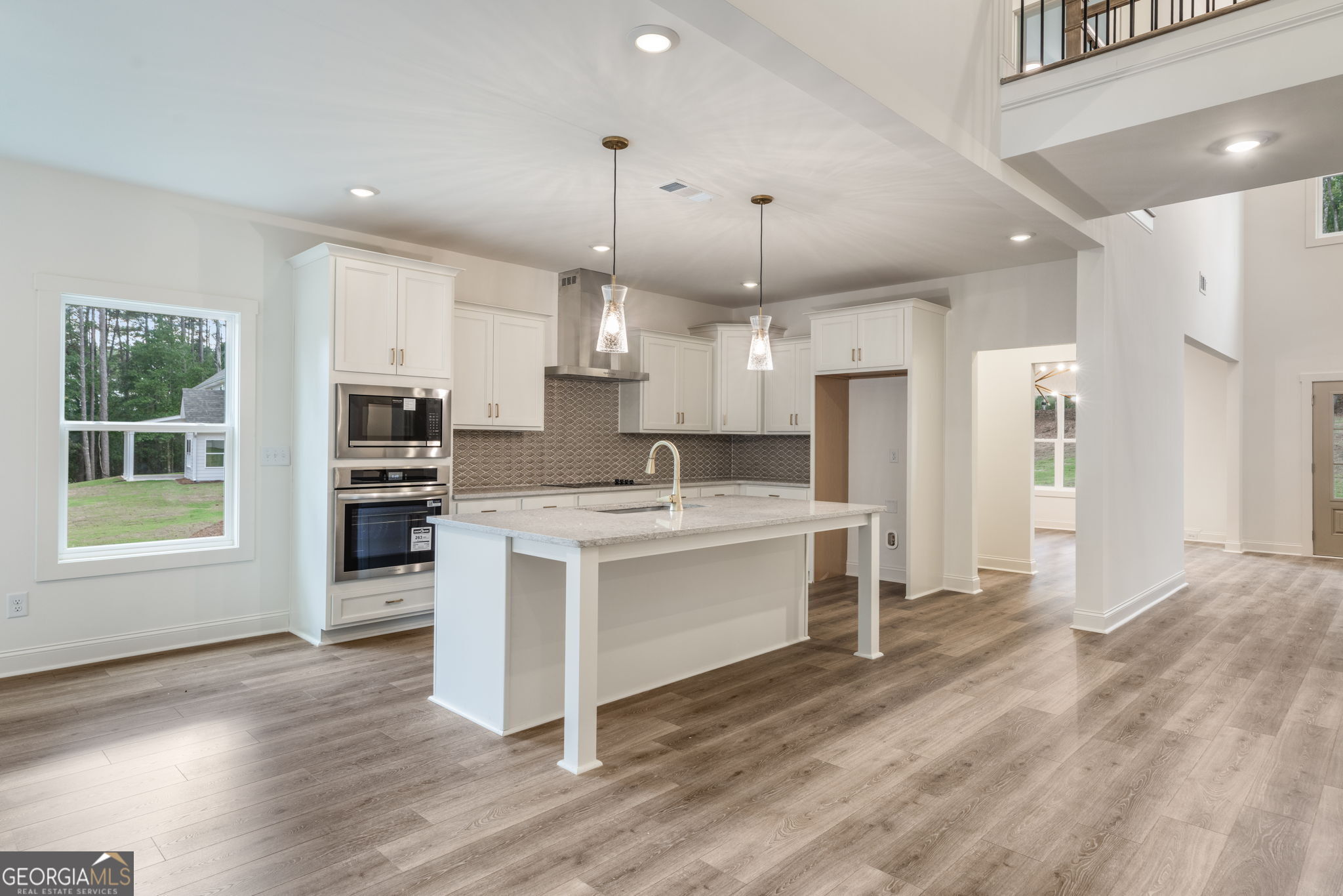 106 Mill Race Road Thomaston, GA 30286 - Photo 18 of 63 a large kitchen with kitchen island a sink stainless steel appliances and cabinets