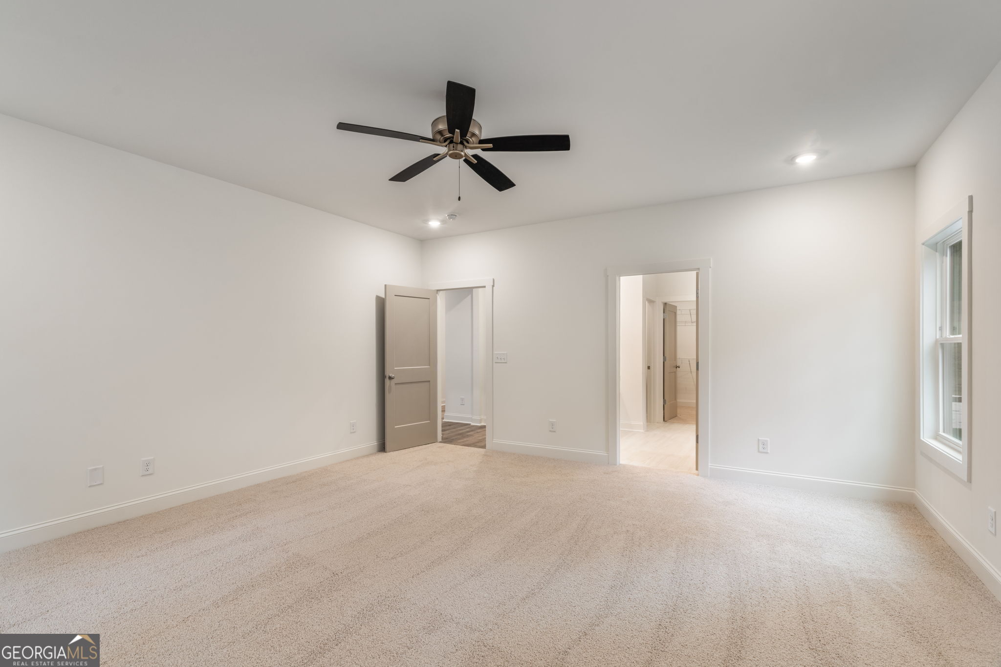 106 Mill Race Road Thomaston, GA 30286 - Photo 21 of 63 a view of a livingroom with a ceiling fan and window