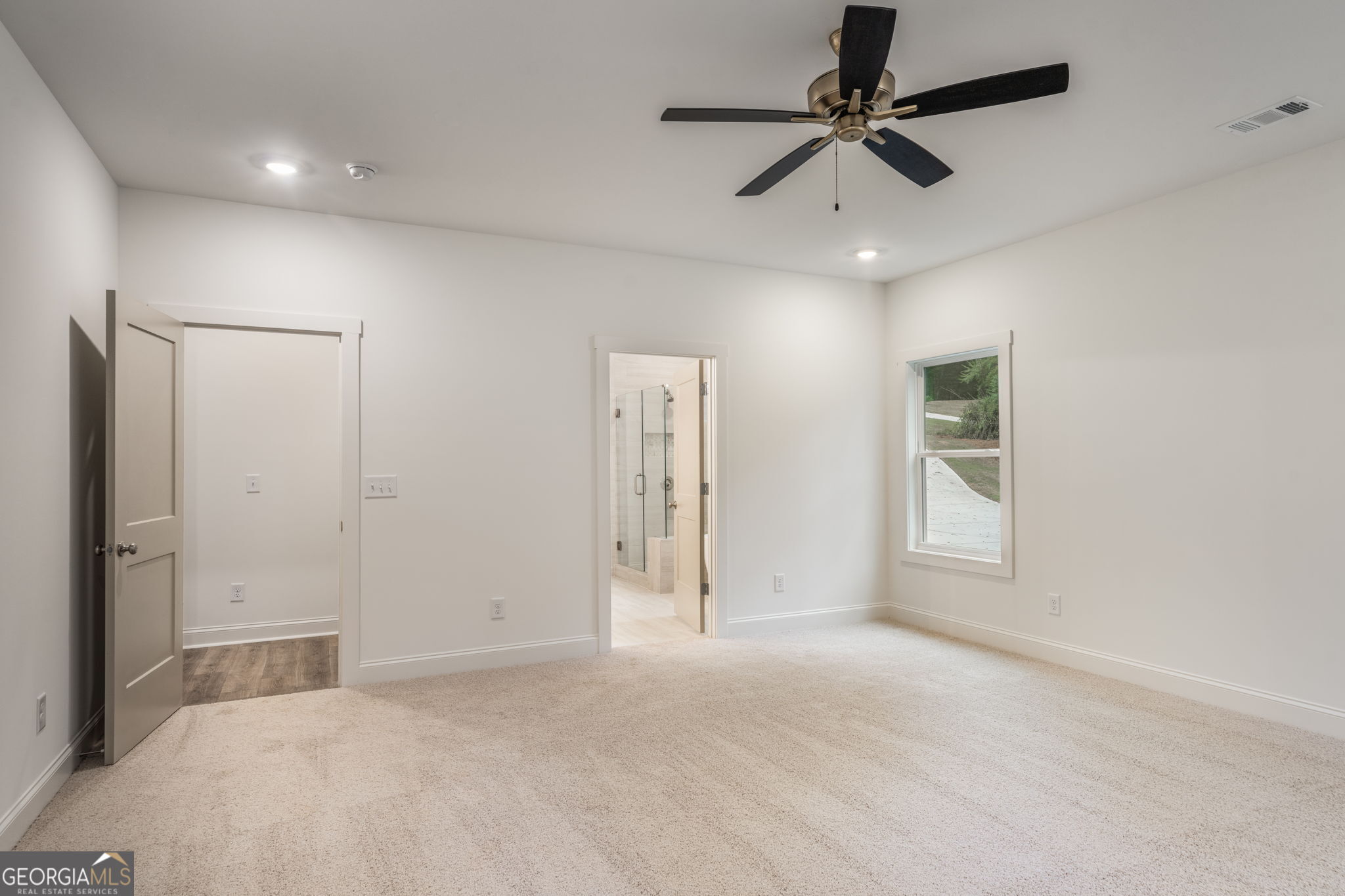 106 Mill Race Road Thomaston, GA 30286 - Photo 23 of 63 a view of an empty room with a window