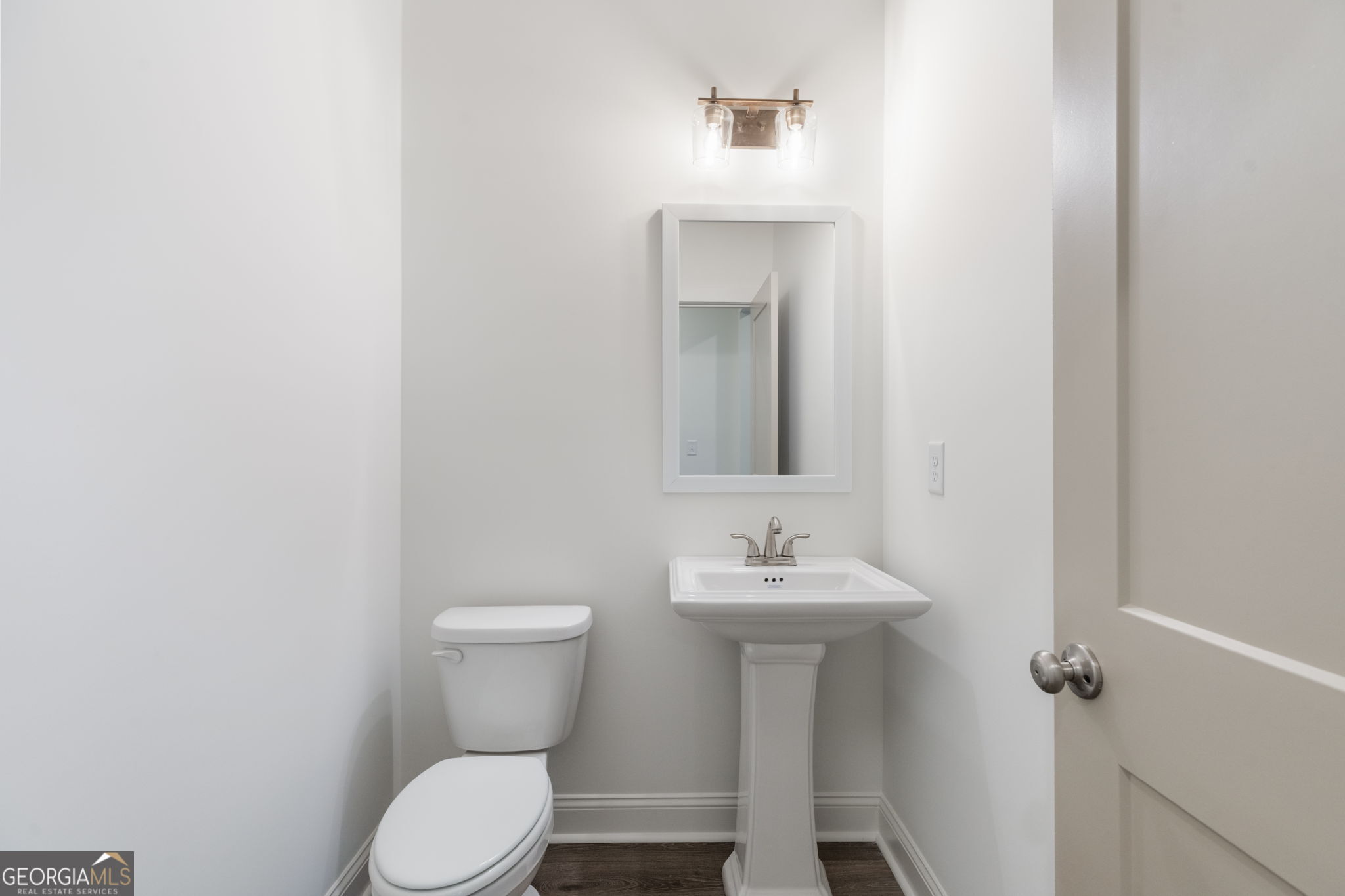 106 Mill Race Road Thomaston, GA 30286 - Photo 33 of 63 a bathroom with a toilet sink and mirror