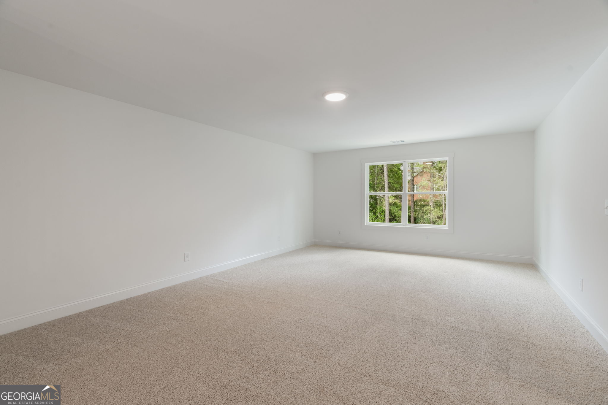 106 Mill Race Road Thomaston, GA 30286 - Photo 44 of 63 an empty room with a window
