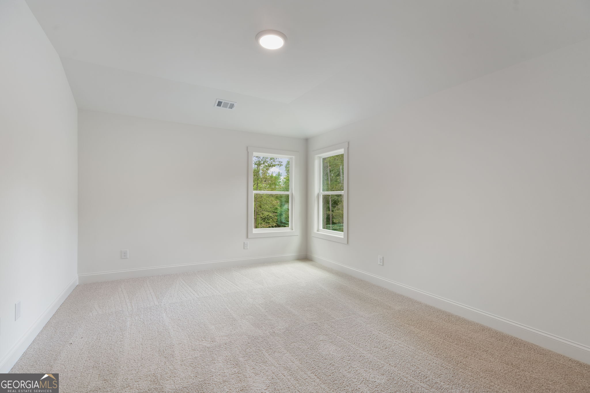 106 Mill Race Road Thomaston, GA 30286 - Photo 45 of 63 an empty room with windows