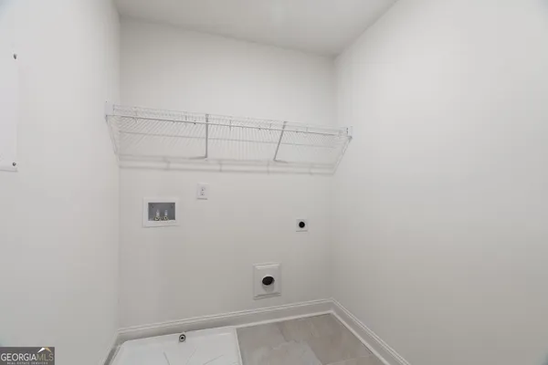 a house with trees in the background