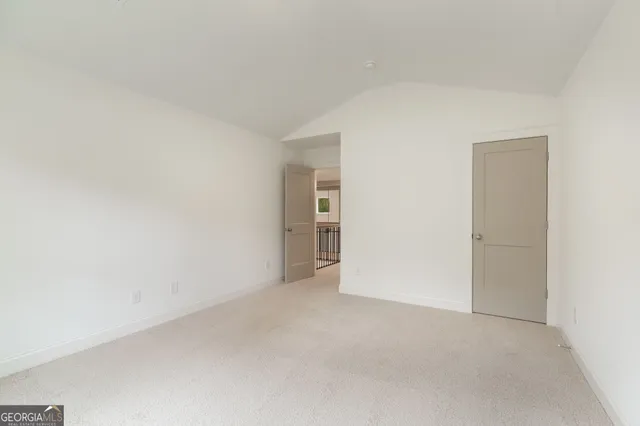 a front view of house with yard and swimming pool