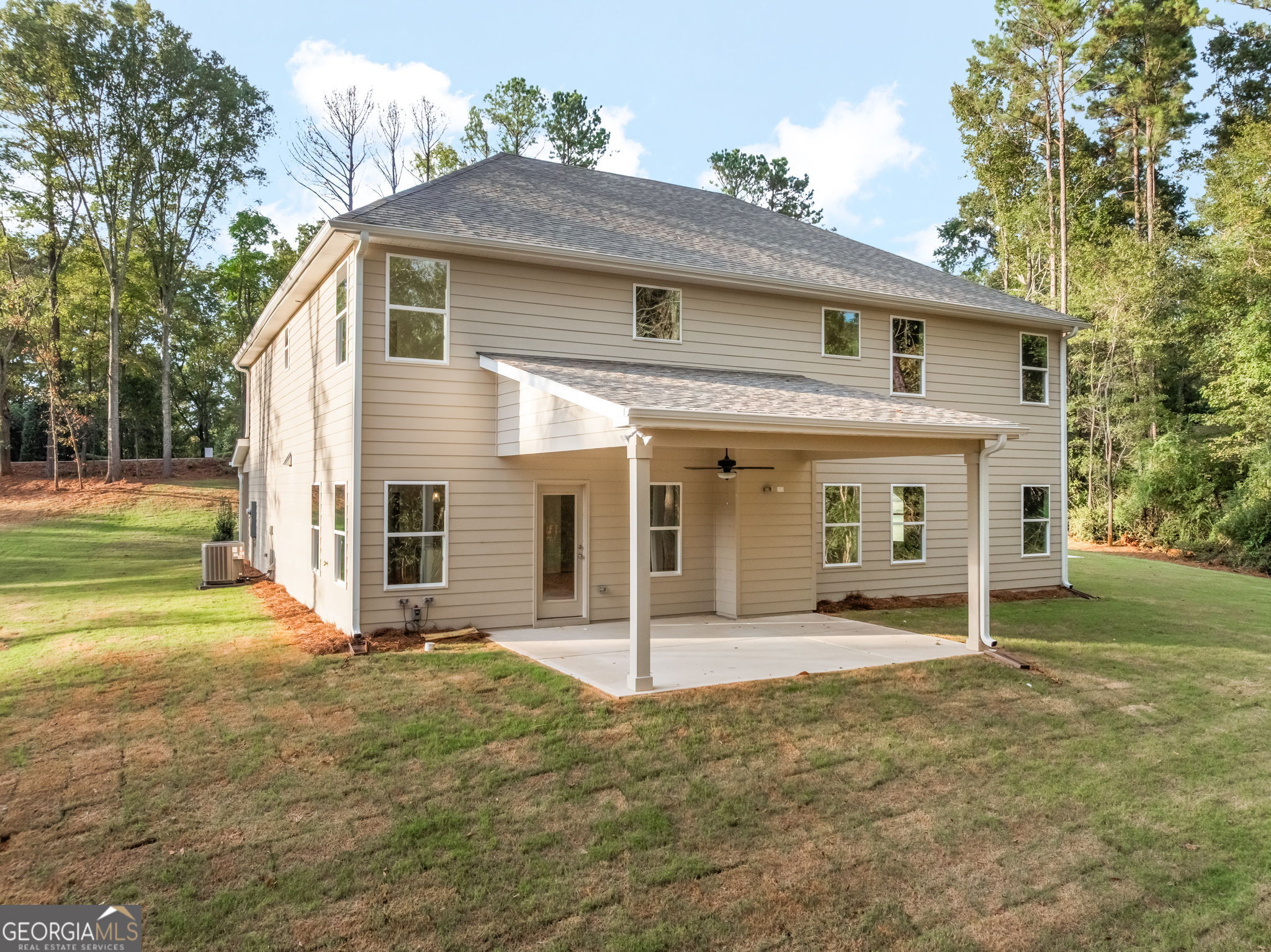 106 Mill Race Road Thomaston, GA 30286 - Photo 56 of 63 a view of a house with a yard and garage