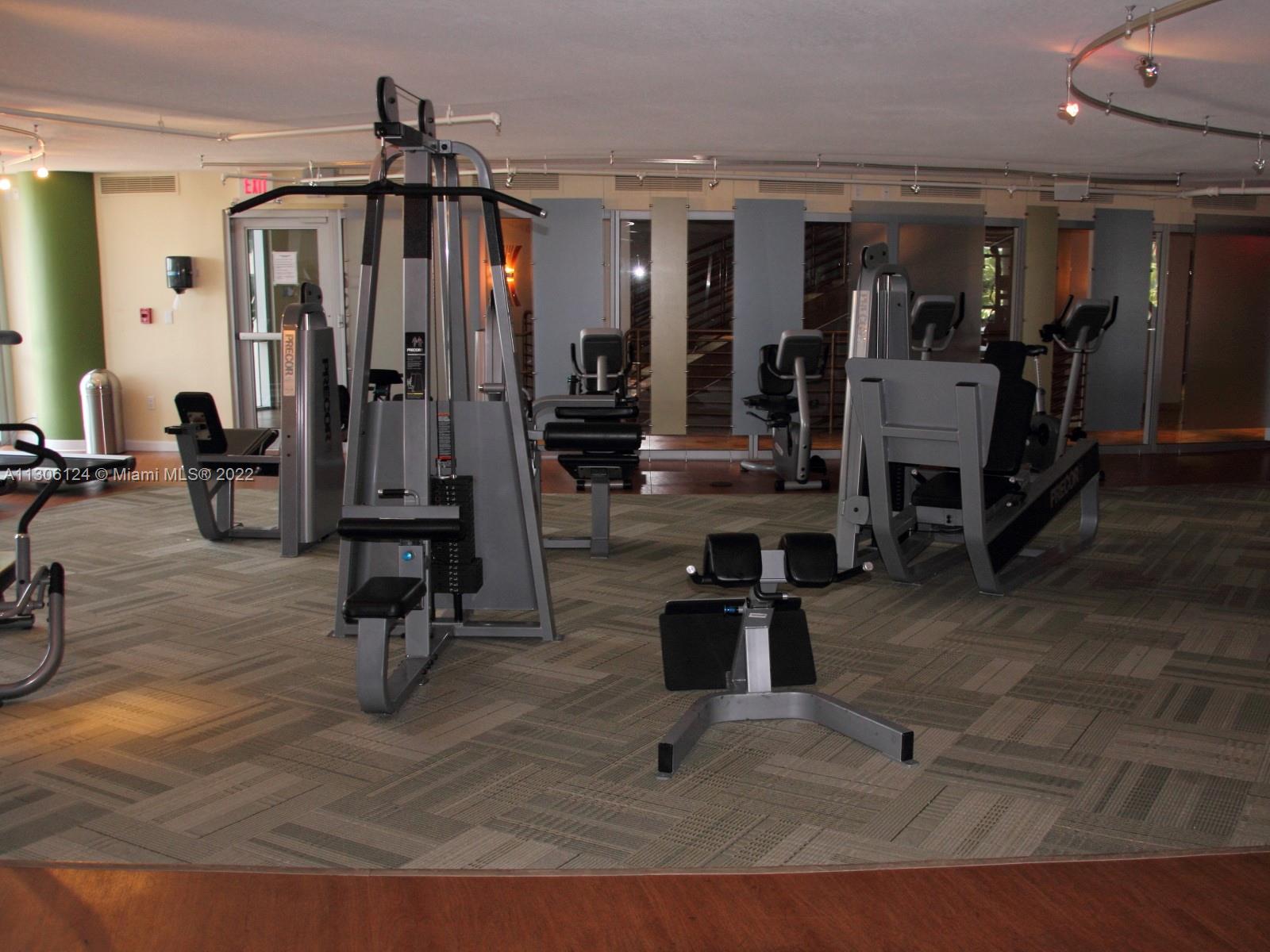 2681 North Flamingo Road, Unit 1905S Sunrise, FL 33323 - Photo 12 of 24 a view of a room with gym equipment