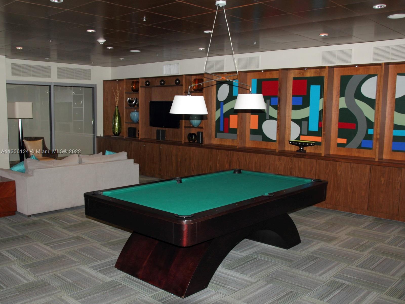 2681 North Flamingo Road, Unit 1905S Sunrise, FL 33323 - Photo 6 of 24 a room with pool table table tennis and stairs