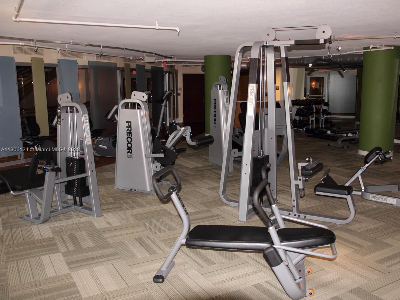 2681 North Flamingo Road, Unit 1905S Sunrise, FL 33323 - Photo 10 of 24 a view of a room with gym equipment