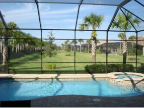 9053 Bronco Court Naples, FL 34113 - Photo 2 of 7 a view of a park