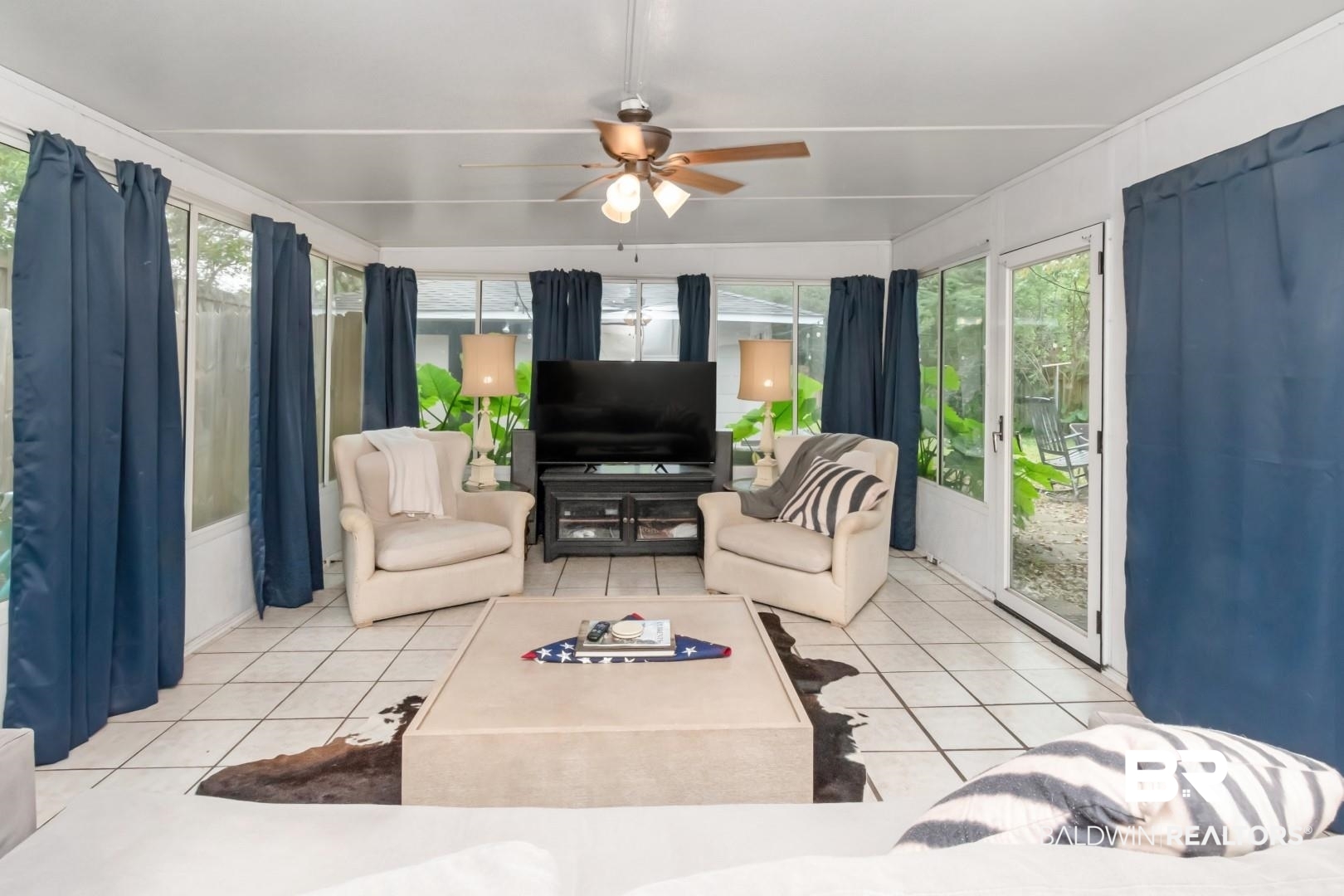 20 Kirby Street Mobile, AL 36607 - Photo 13 of 35 Sunroom with a wealth of natural light and ceiling fan