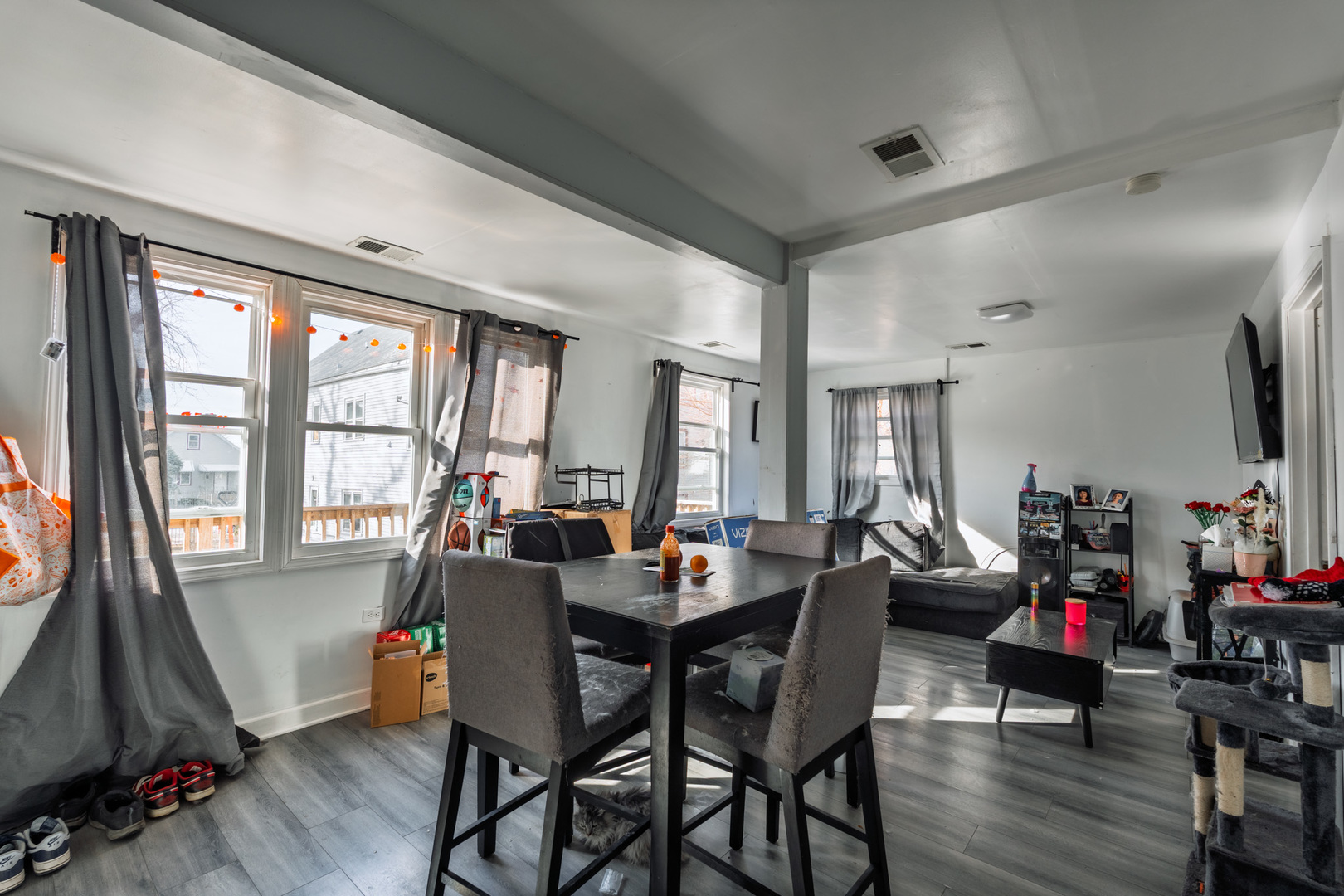 5239 South Troy Street Chicago, IL 60632 - Photo 11 of 21 a view of a dining room with furniture window and wooden floor