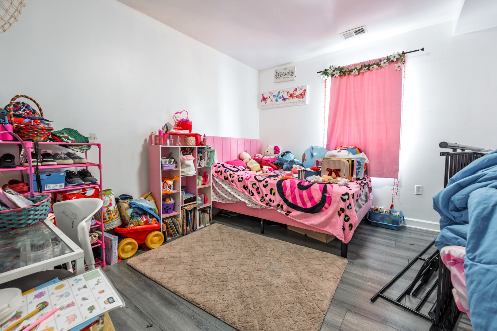 5239 South Troy Street Chicago, IL 60632 - Photo 17 of 21 a bedroom with furniture and a wooden floor