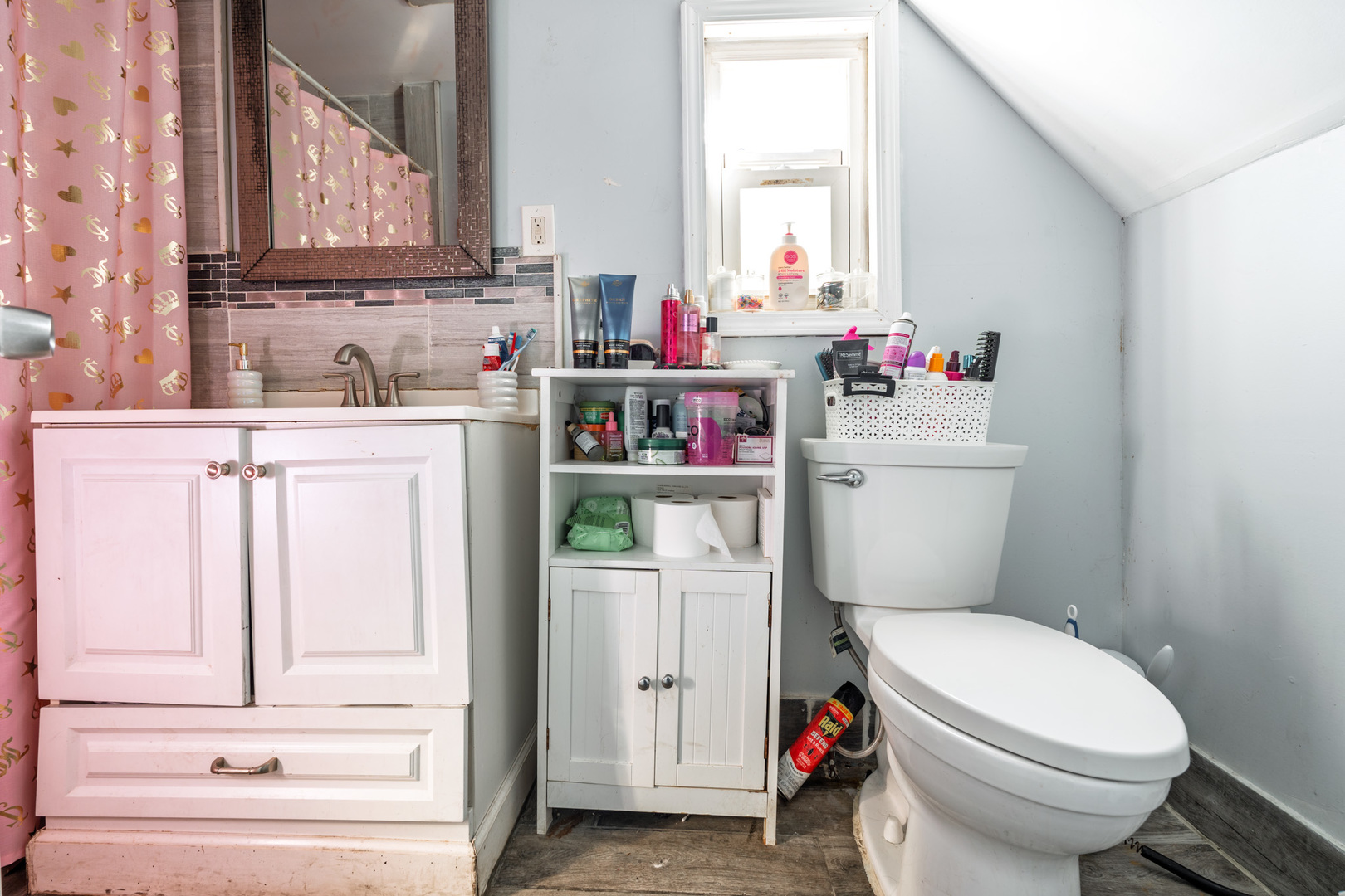 5239 South Troy Street Chicago, IL 60632 - Photo 20 of 21 a bathroom with a sink toilet vanity and tub
