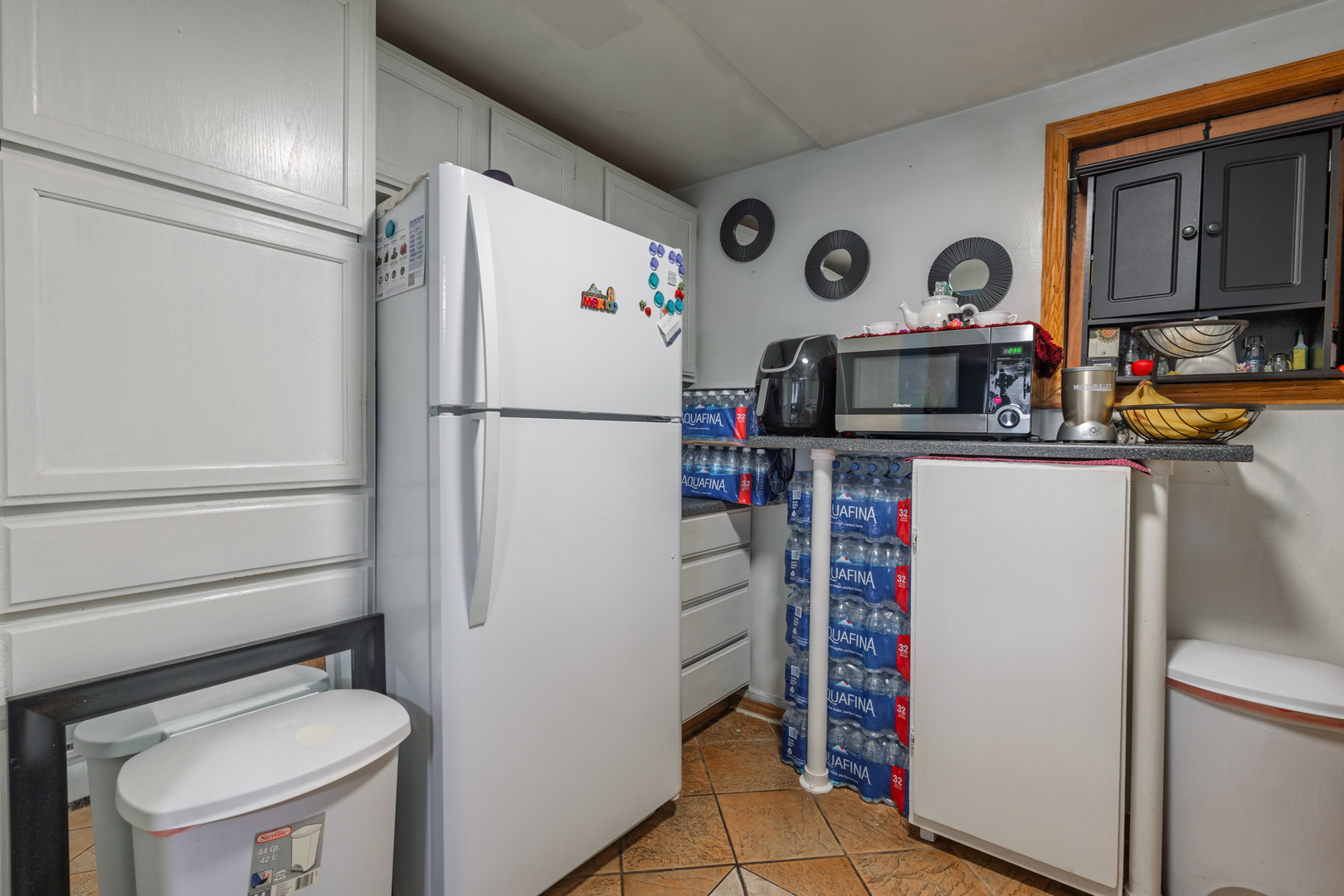 5239 South Troy Street Chicago, IL 60632 - Photo 10 of 21 a utility room with refrigerator and washer