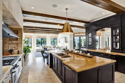 an aerial view of a house with outdoor space and street view