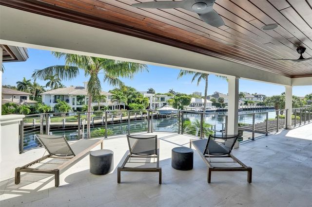 front view of a brick building with a yard