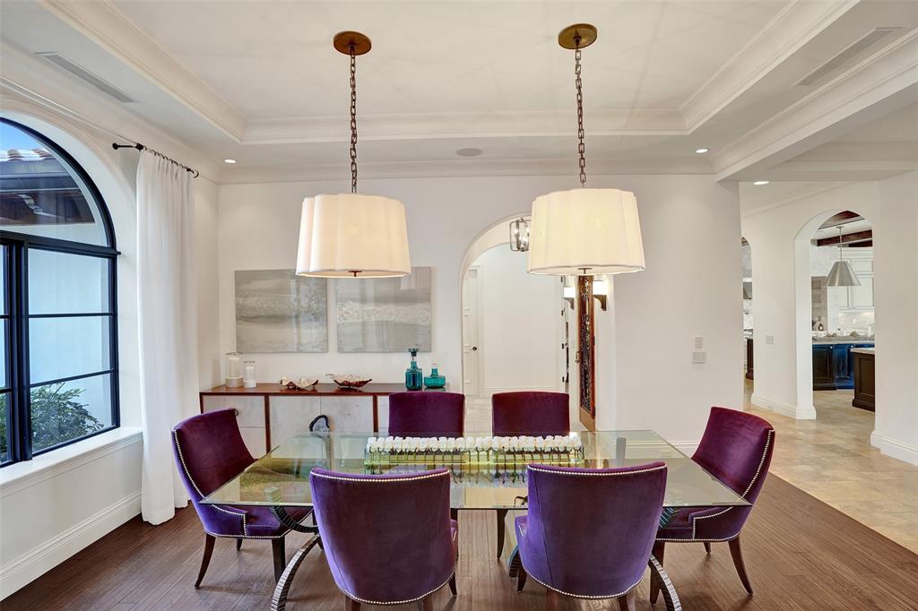 35 Compass Isle Fort Lauderdale, FL 33308 - Photo 50 of 90 a dining room with furniture a chandelier and wooden floor