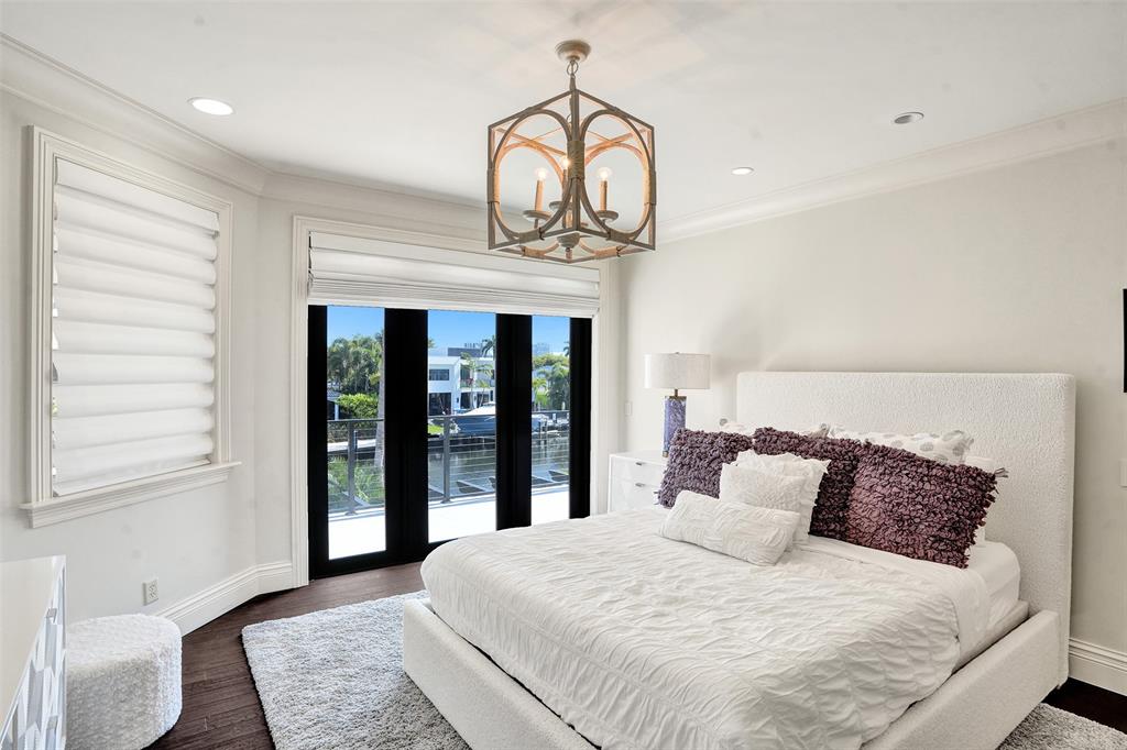35 Compass Isle Fort Lauderdale, FL 33308 - Photo 67 of 90 a bedroom with a bed and a window