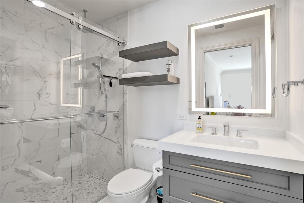 35 Compass Isle Fort Lauderdale, FL 33308 - Photo 68 of 90 a bathroom with a sink vanity mirror and toilet