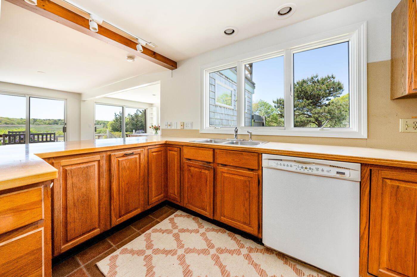 52 Captain Linnell Road Orleans, MA 02653 - Photo 12 of 41 a view of a kitchen with sink and windows