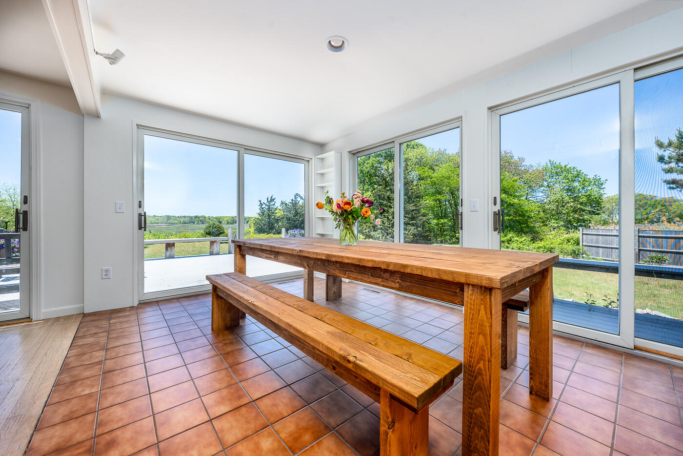 52 Captain Linnell Road Orleans, MA 02653 - Photo 14 of 41 a kitchen with stainless steel appliances granite countertop a stove a sink and a wooden cabinets