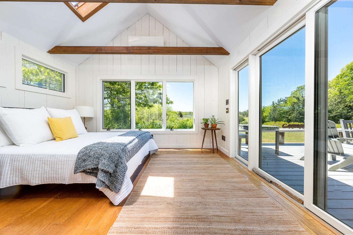 52 Captain Linnell Road Orleans, MA 02653 - Photo 16 of 41 a spacious bedroom with a bed and wooden floor