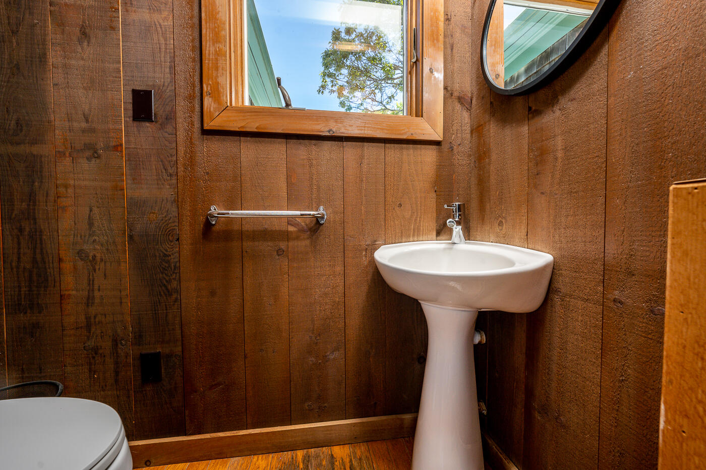 52 Captain Linnell Road Orleans, MA 02653 - Photo 19 of 41 a bathroom with a sink a mirror and a toilet