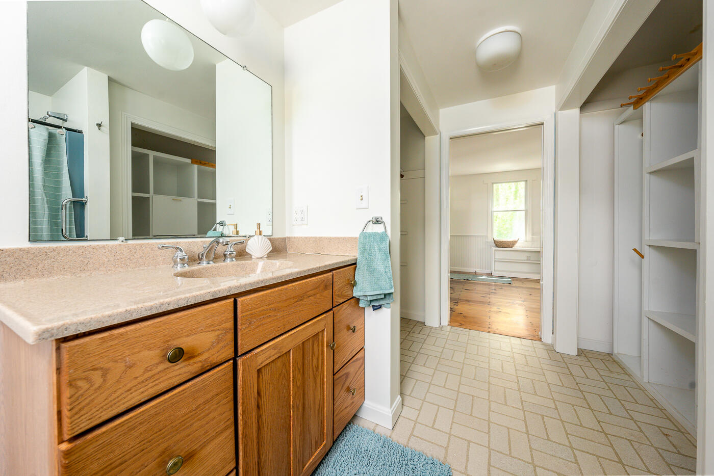 52 Captain Linnell Road Orleans, MA 02653 - Photo 23 of 41 a bathroom with a sink a mirror and a shower