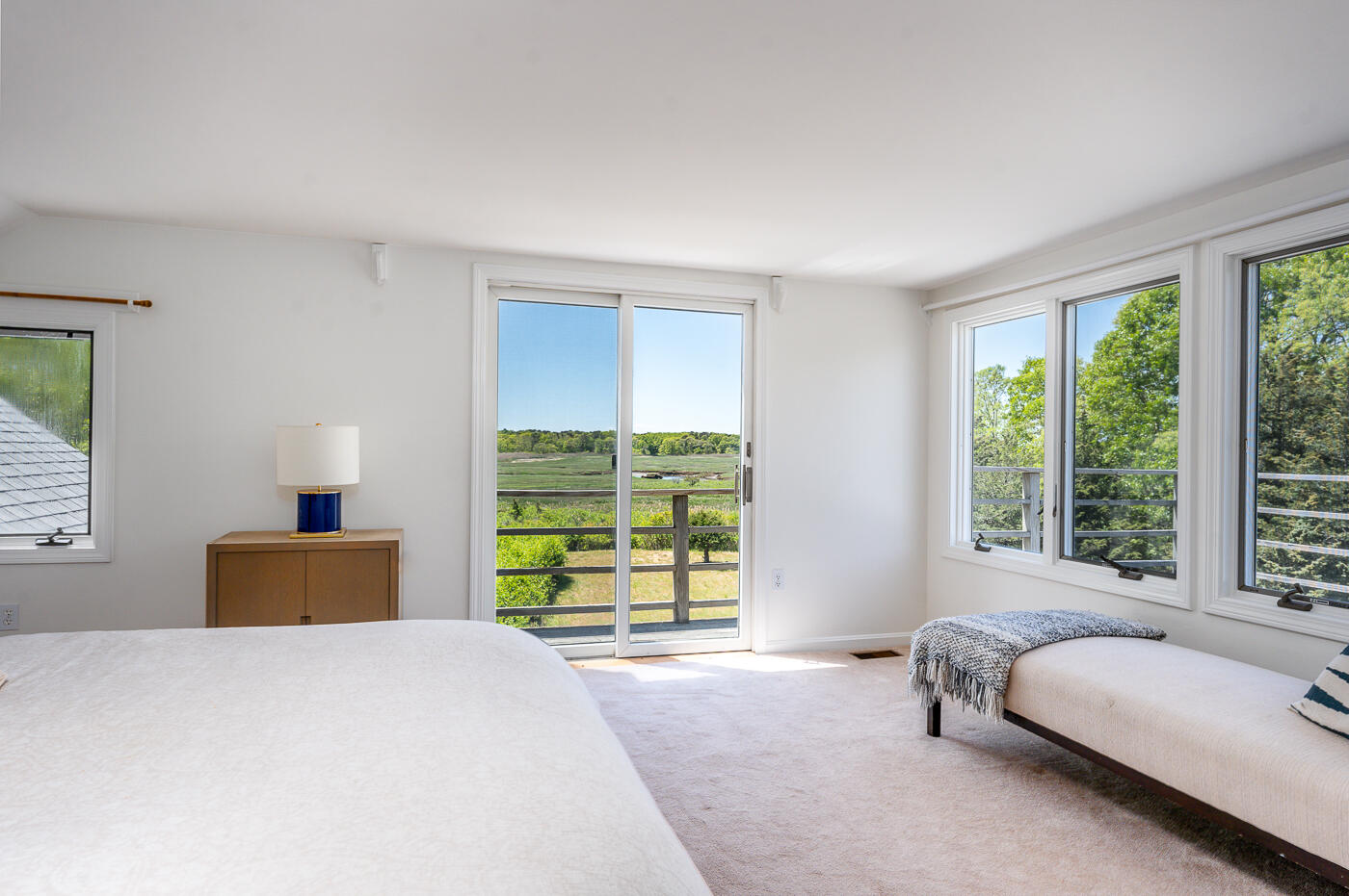 52 Captain Linnell Road Orleans, MA 02653 - Photo 25 of 41 a bedroom with a bed and a large window