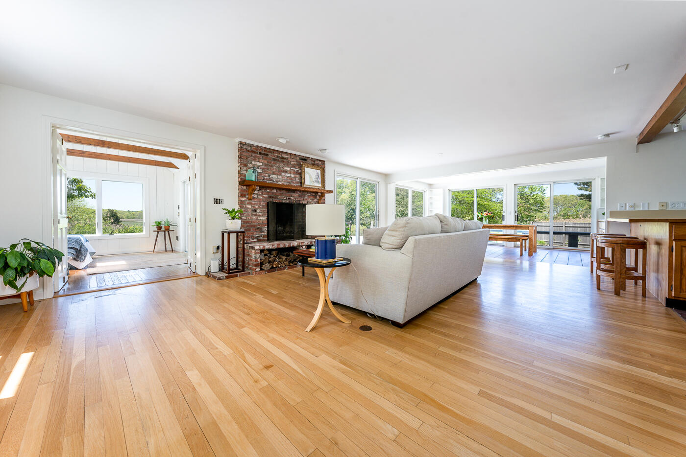 52 Captain Linnell Road Orleans, MA 02653 - Photo 6 of 41 a living room with furniture and a wooden floor