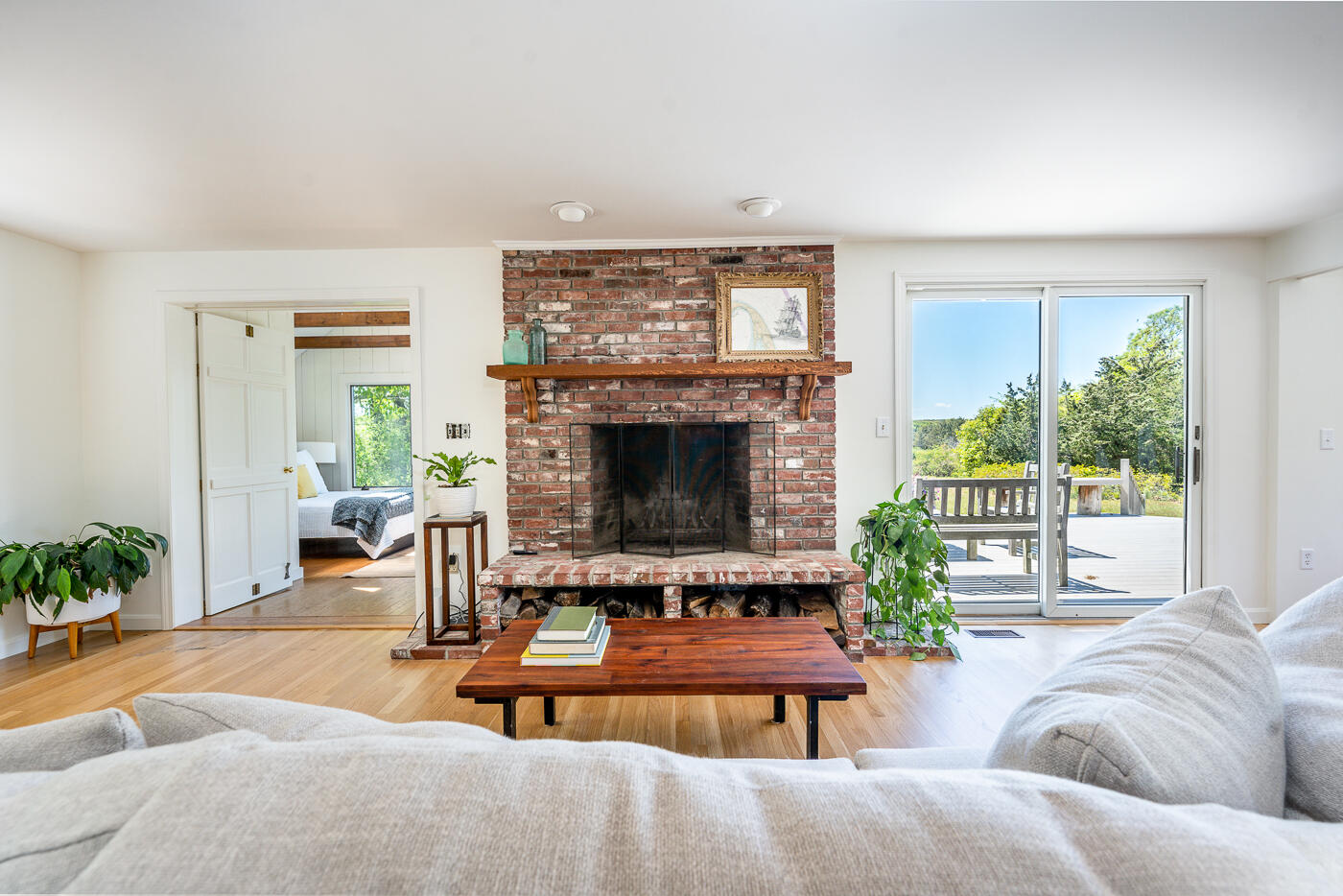 52 Captain Linnell Road Orleans, MA 02653 - Photo 7 of 41 a living room with furniture fireplace and a large window